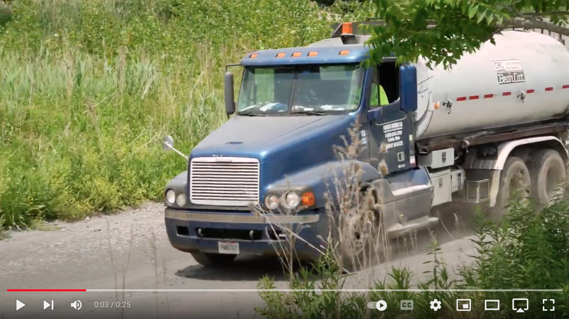 Cousco Brown You Tube Video Truck Spraying Gravel Path